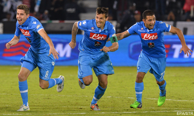 Napoli players celebrating after the penalty shootout victory